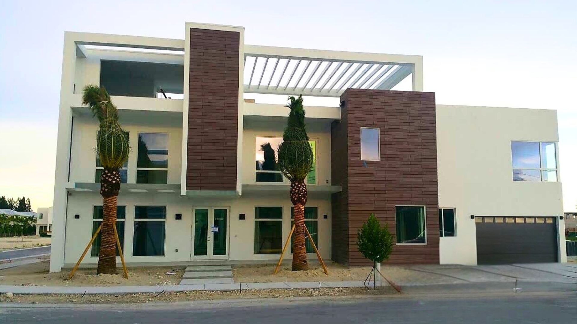 Custom home exterior built by A Class Builders South Florida